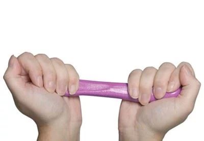 person using therapeutic putty