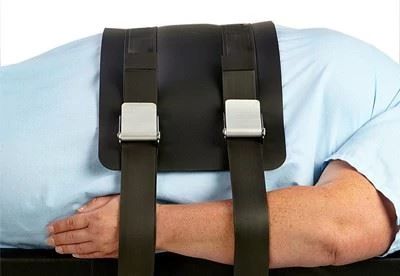 bariatric patient on operating table with patient safety strap
