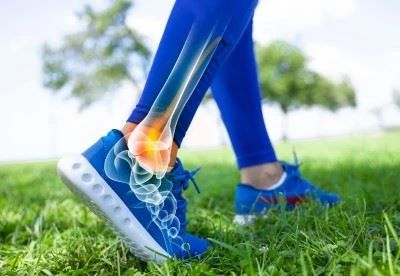 graphic pain point of ankle on person walking