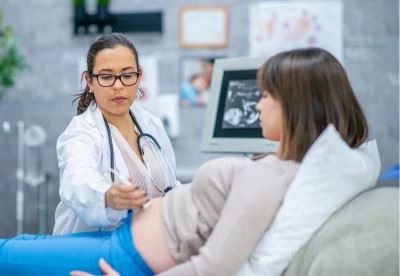 nurse doing an ultrasound on patient
