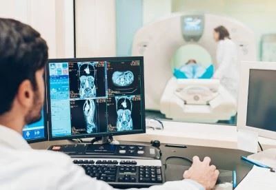 doctor checking scans from mri