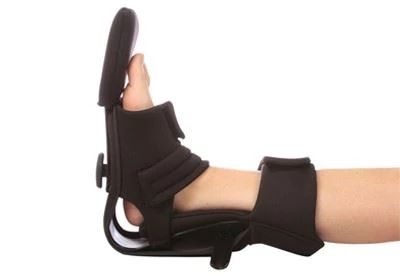 person wearing multiboot on foot