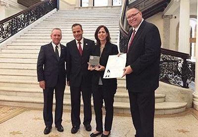 AliMed employees accepting manufacturer of the year award