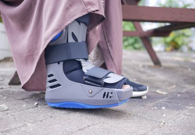 person wearing boot on foot