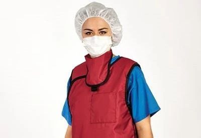 nurse wearing radiation protection garments and accessories
