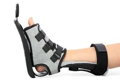 person wearing multiboot on foot