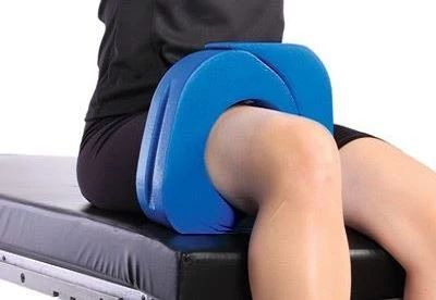 patient on operating table with arthroscopic leg holder