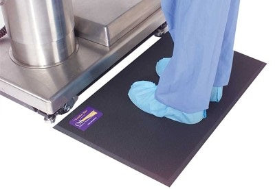 doctor standing on anti fatique mat