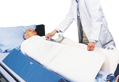 doctor positioning patient on bed