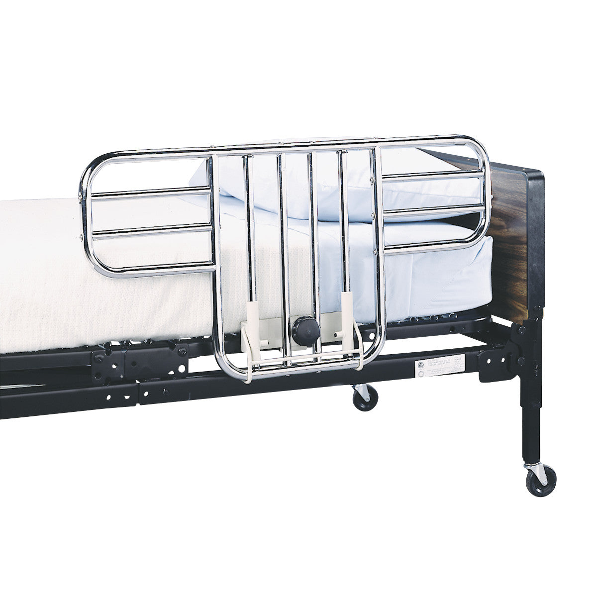 A Drive Medical Half Rail attached to a hospital bed with metal bars and a locking mechanism for safety.