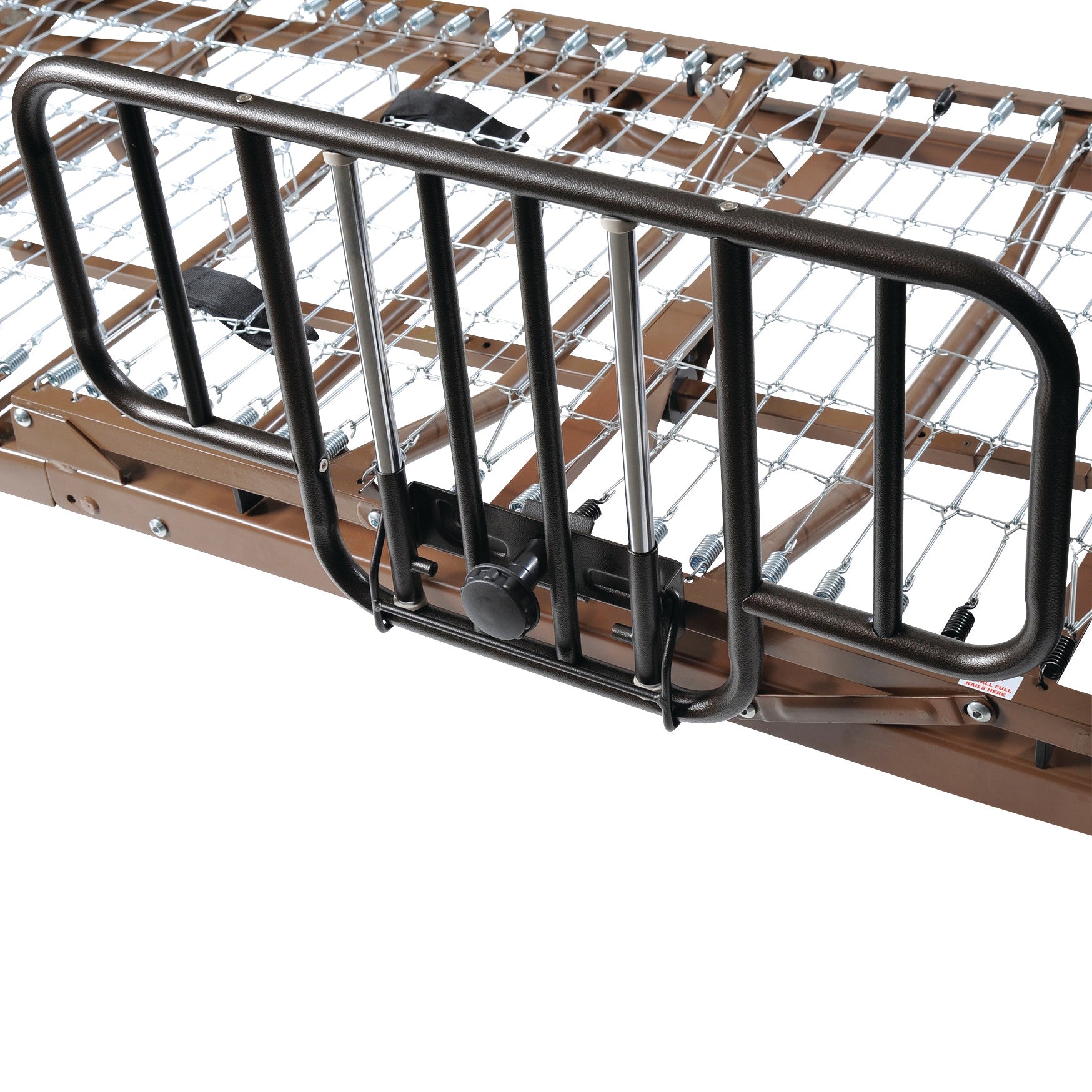 The Drive Medical Half Rail attached to a metal bed frame with wire mesh springs, featuring a brown finish and adjustable locking knob.