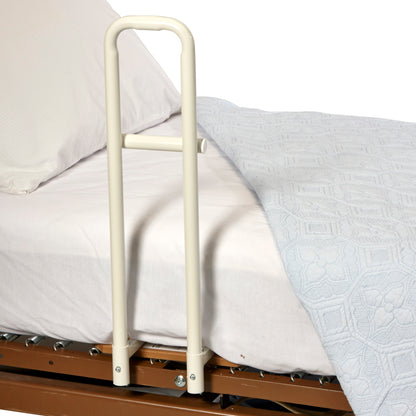 Transfer Handle Hospital Model for Spring-Based Beds attached to a bed, with white bedding and a blue patterned blanket.