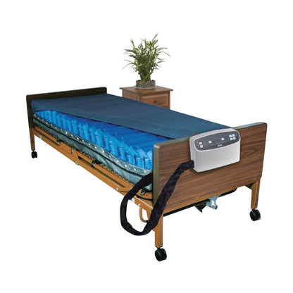 Drive Medical Med-Aire Plus 8" Alternating Pressure and Low Air-Loss Mattress System on a hospital bed, with a plant on a nightstand.