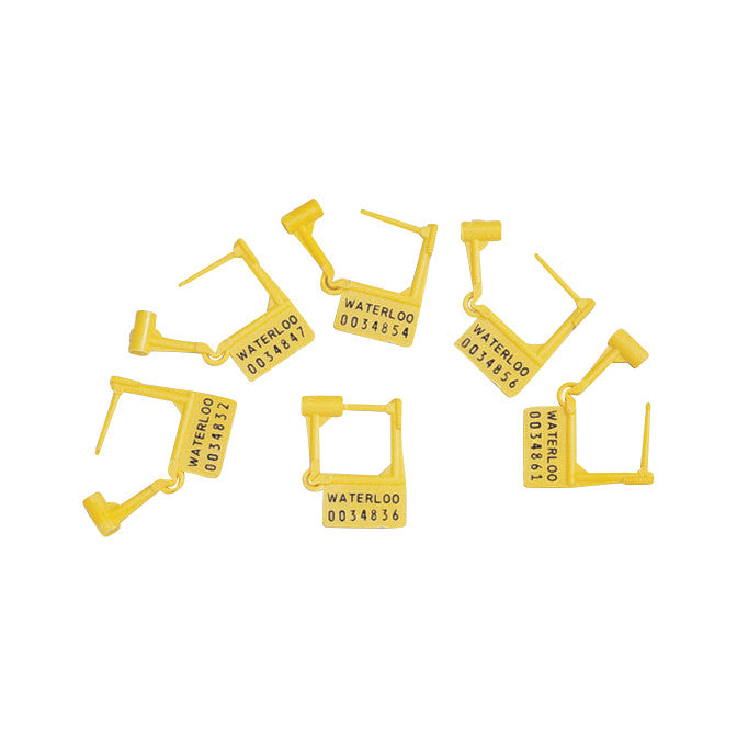 Yellow plastic breakaway seals, labeled with 'Waterloo,' used as a medical cart accessory by Waterloo Healthcare.