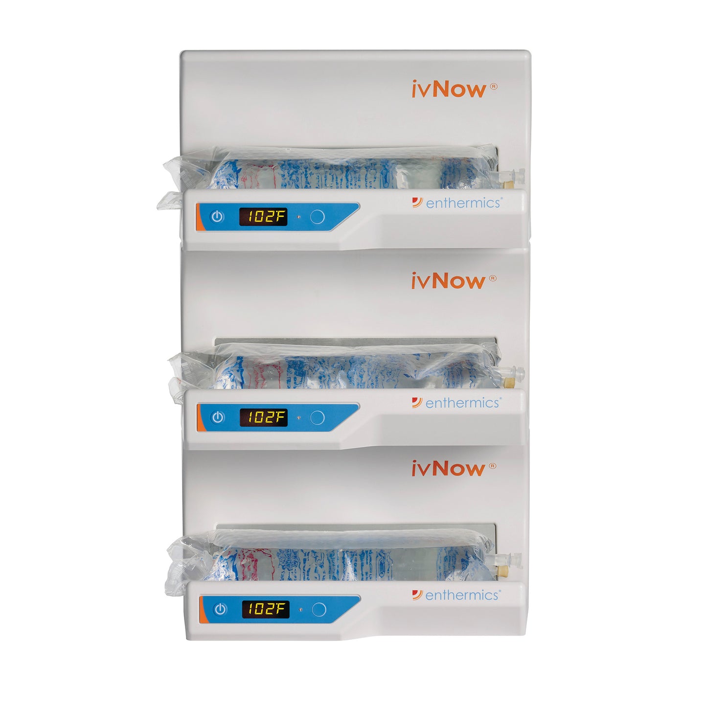 The ivNow Fluid Warmer holds three IV bags at 102�F, each in a compartment with a digital display and power button.