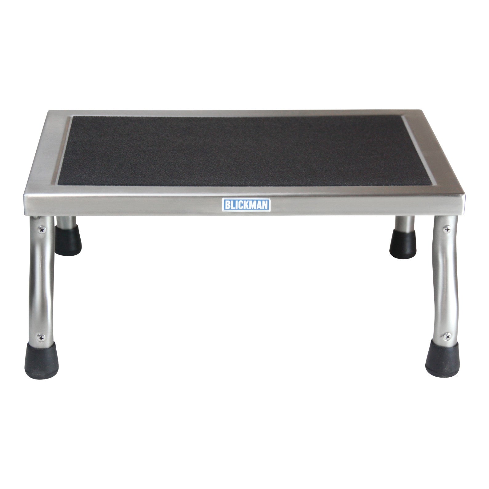 The Blickman MR-Conditional Kent Footstool is a stainless steel footstool with a black non-slip surface, supported by four sturdy legs.