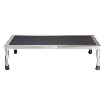 The Blickman MR-Conditional Kent Footstool features a rectangular platform with a black non-slip surface and four metal legs.