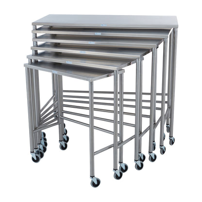 Six stainless steel Blickman Nested Instrument Tables are stacked, showing various sizes, each on wheels for mobility.