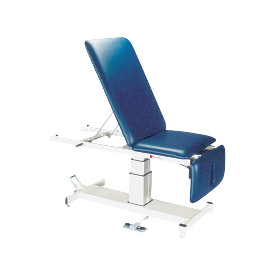 The Armedica AM-SP350 Treatment Table features an adjustable blue cushioned surface on a sturdy white metal frame.
