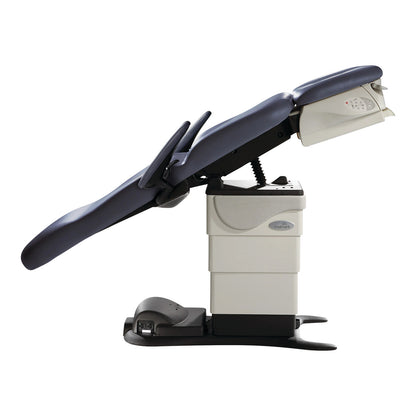 The Midmark Podiatry Chair Programmable Model 647 Blue is shown reclined, featuring cushioned blue upholstery and adjustable armrests.