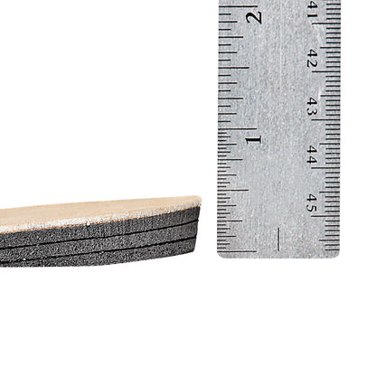 AliMed Adjustable Heel Lift beside a ruler. The lift has multiple layers for adjustment and measures about 1.7 inches in height.