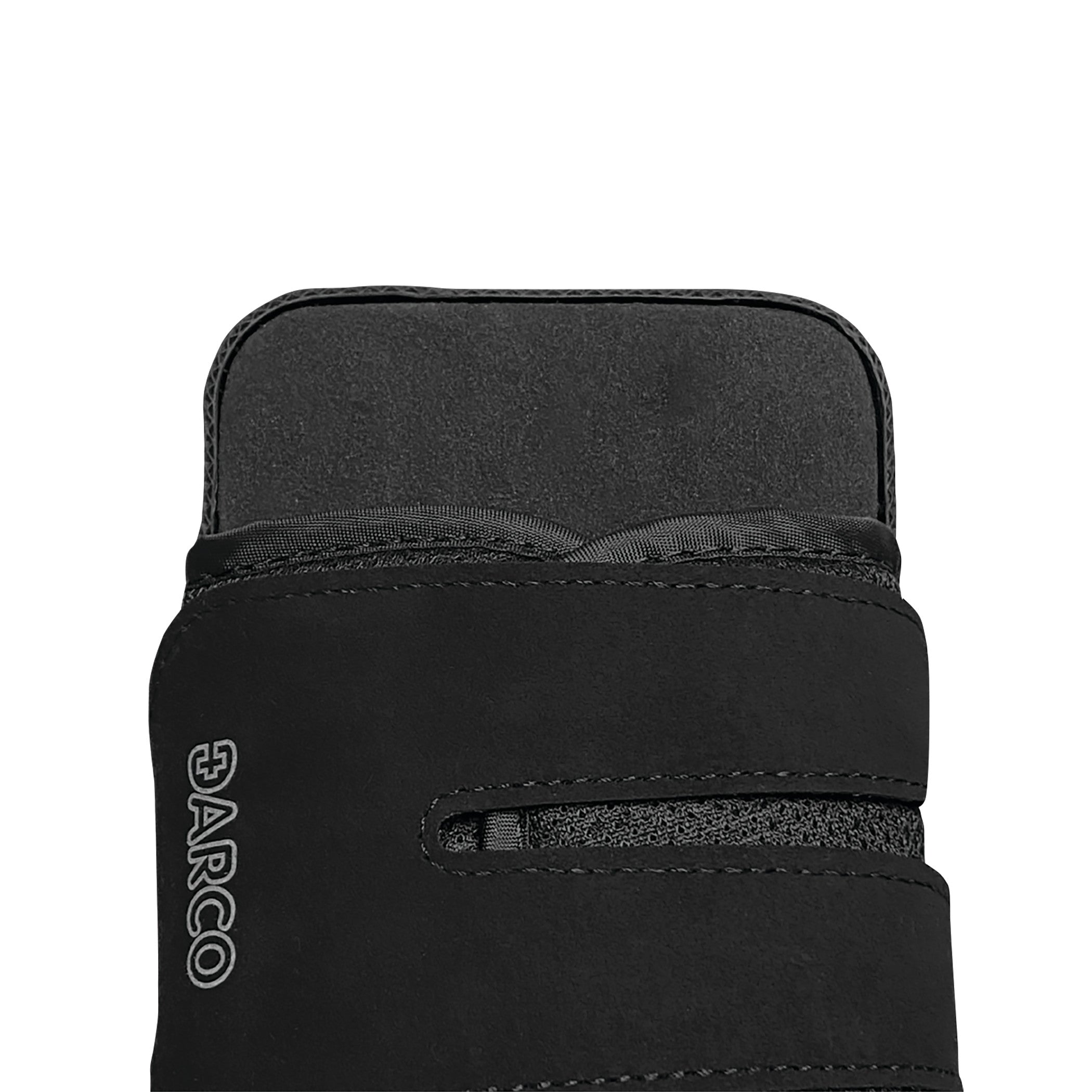 Close-up of the black DARCO OrthoWedge Shoe, showing its textured upper design with two straps and the brand logo.