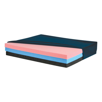 The AliMed Deluxe T-Foam Combo Wheelchair Cushion has layers of pink, blue, and black foam with a dark blue cover partially unzipped.