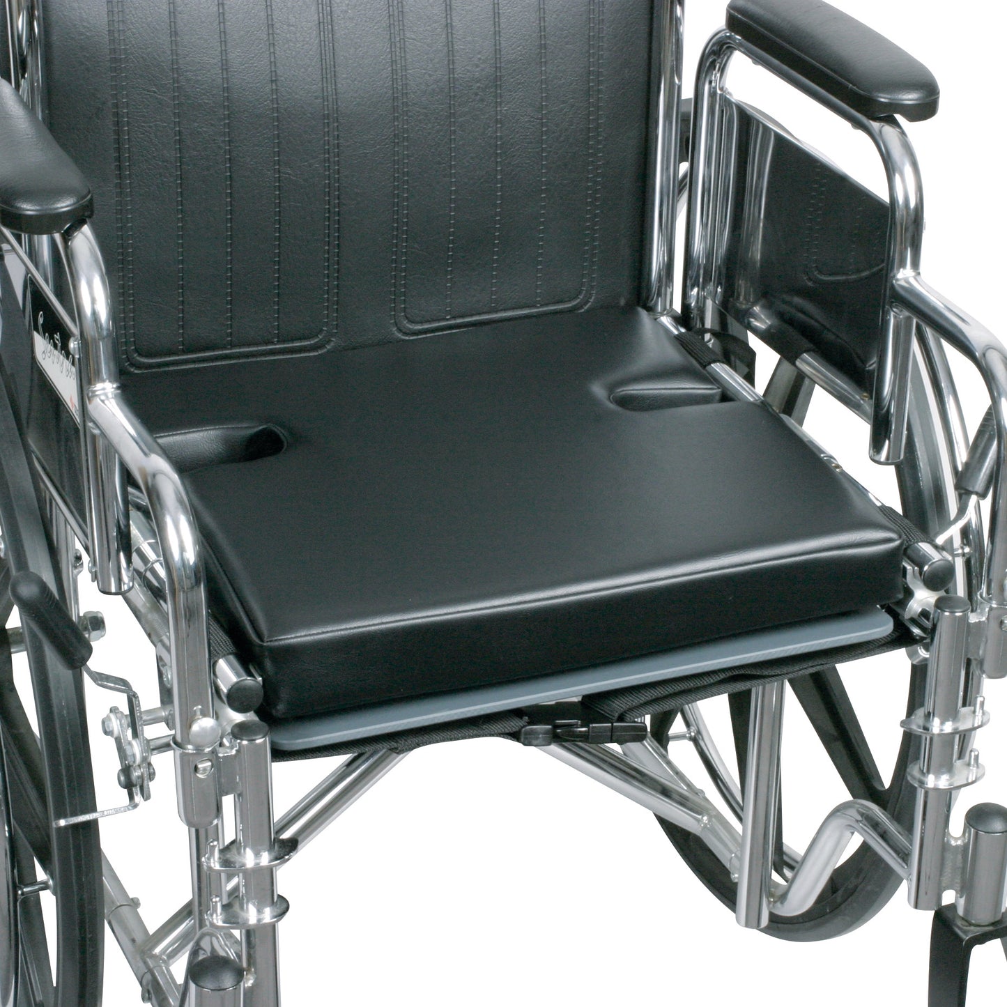 AliMed Drop Seat with T-Foam Combo Wheelchair Cushion on a wheelchair, featuring a black cushioned seat with cutouts.
