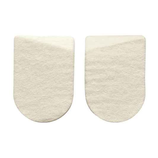 Two beige Hapad Medial/Lateral Heel Wedges with rounded bottoms on a white background.