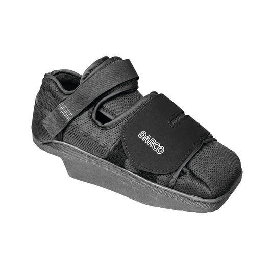 A DARCO HeelWedge Healing Shoe, featuring a black design with straps and a wedged sole for support.