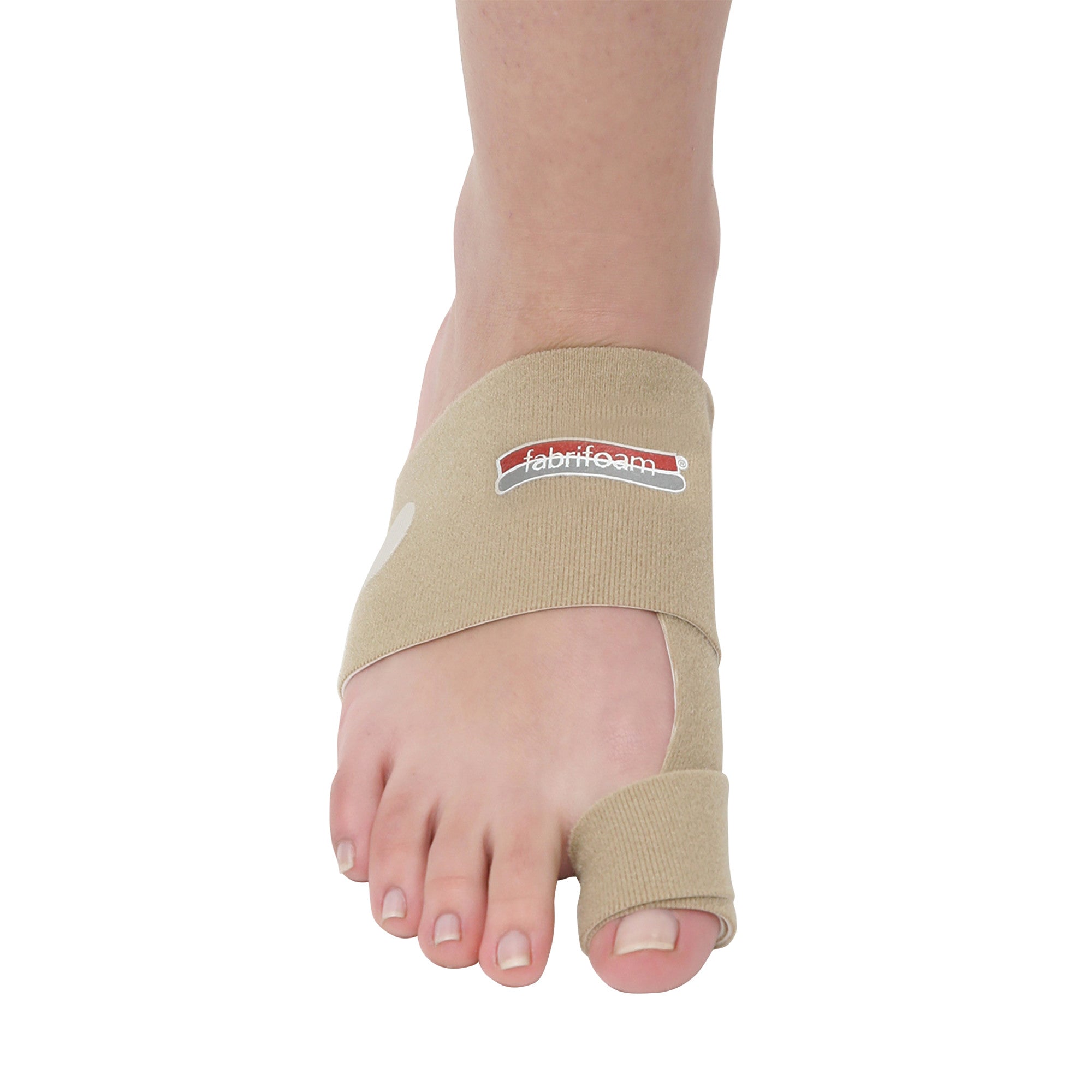 A foot wearing a beige Bunion Sling with the "fabrifoam" logo, designed to support and align the big toe.