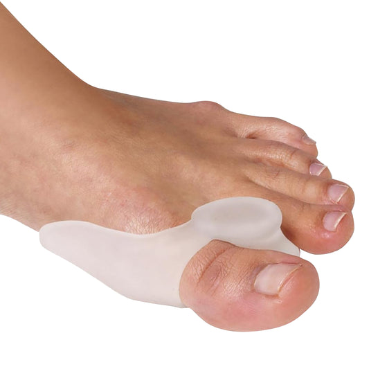 A foot wearing a PediFix Visco-GEL Dual-Action Toe Space/Bunion Guard Combo, positioned between the big toe and second toe.