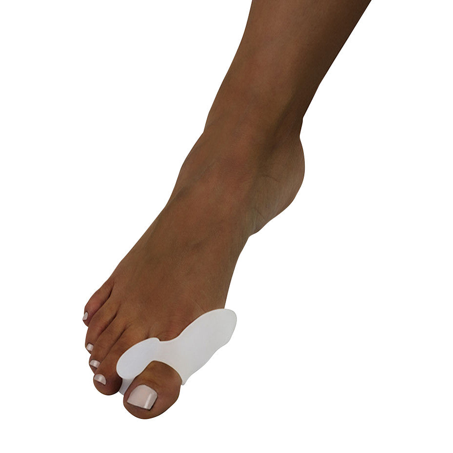 Foot with a Silipos Hallux Bunion Guard with Spacer on the big toe, designed to provide cushioning and alignment.