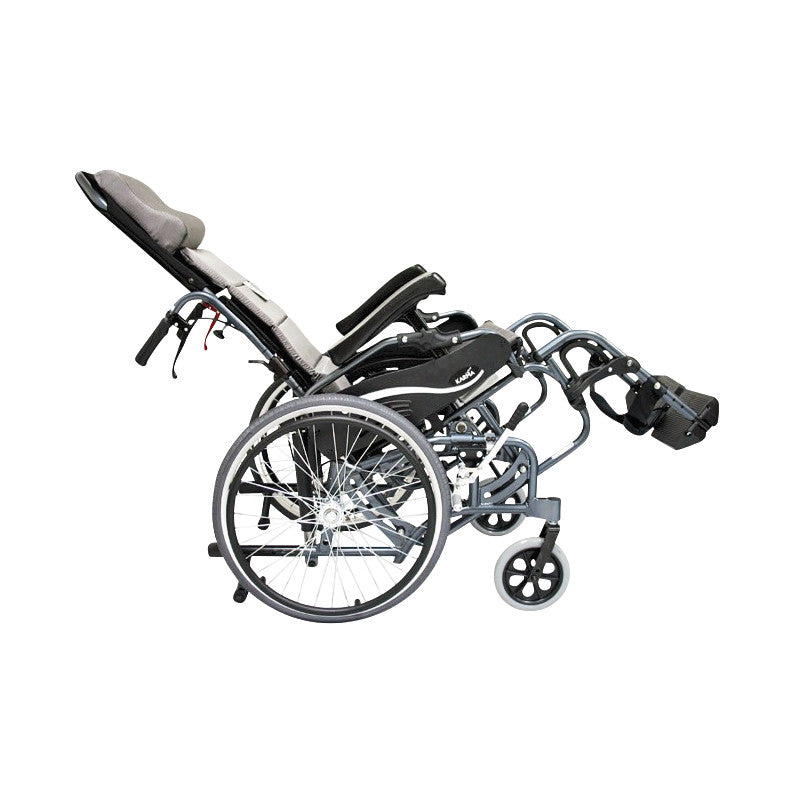 The Karman VIP Series 515 Tilt-in-Space Wheelchair is shown reclining, with a sleek frame and cushioned seat and backrest.