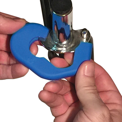 Hands hold a blue Calf Bumper, which is being attached to a metallic pole.