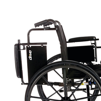 Close-up of the Drive Medical Cruiser X4 Wheelchair with full arms, elevating leg rests, and large rear wheels.