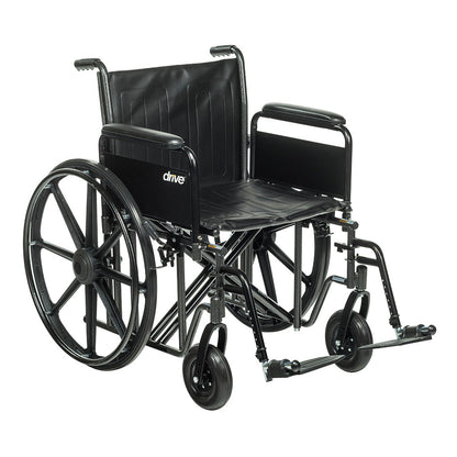 The Drive Medical Sentra EC Heavy-Duty Wheelchair has full arms, swing-away footrests, and large rear wheels for mobility.