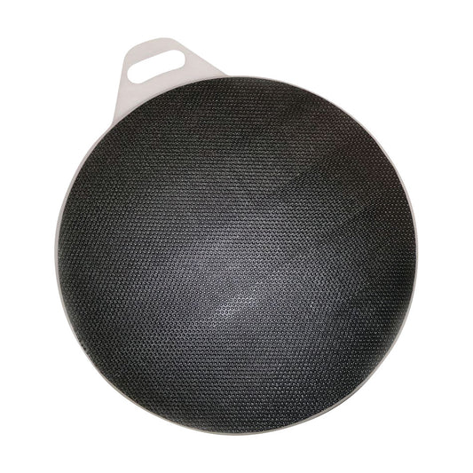 The SafetySure Pivot Disc, a black textured circular mobility aid with a handle, designed to assist with safe patient transfers.