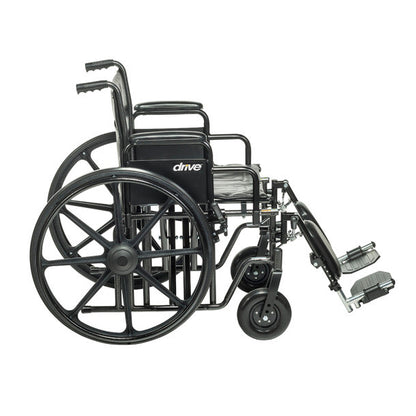 Drive Medical Sentra EC Heavy-Duty Wheelchair with Removable Desk Arms and Elevating Leg Rests, viewed from the side on a white background.