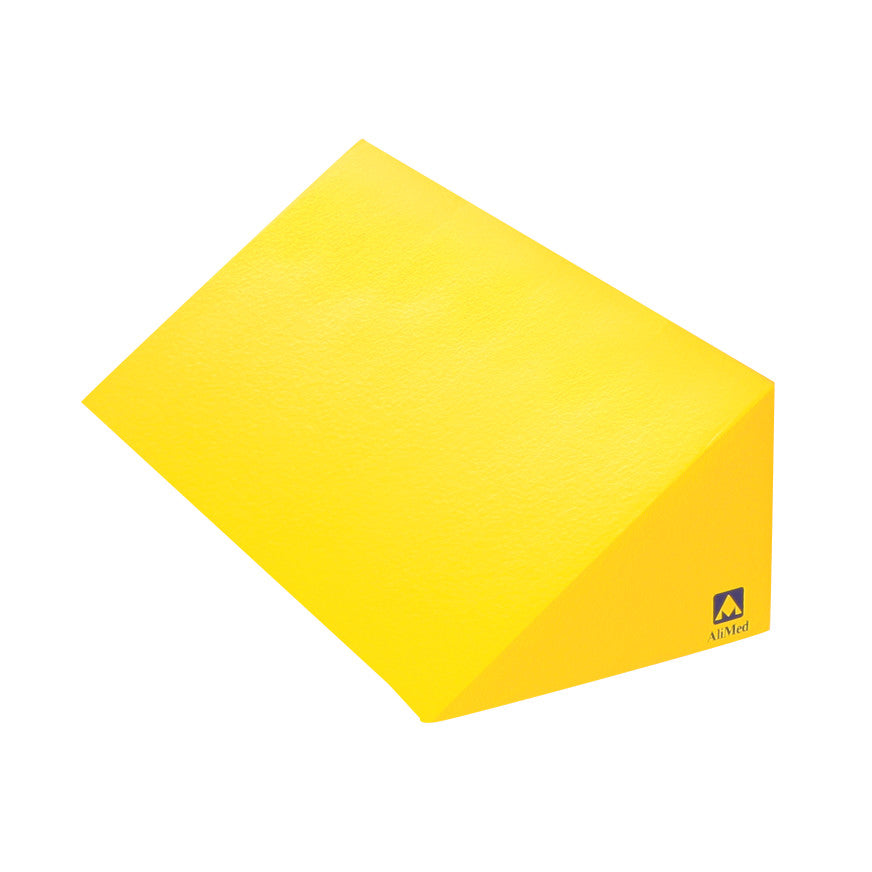 Yellow AliMed Protecta-Coat 35/55 Degree Wedge Positioner with a logo on the side, used for positioning and support.