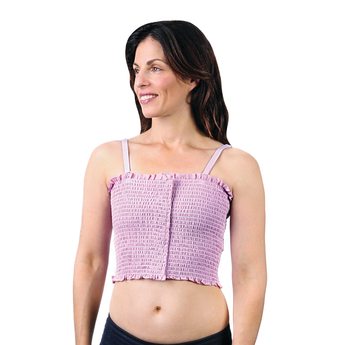 A woman is wearing an Expand-A-Band Lined Breast Binder in pink with ruffled edges and adjustable straps.