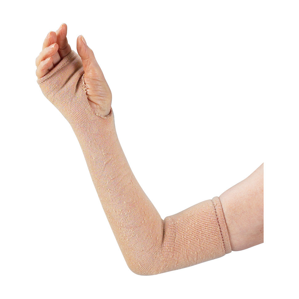 An arm wearing a SkiL-Care Geri-Sleeve, a beige compression sleeve with an opening for the thumb, reaching from the wrist to the upper arm.