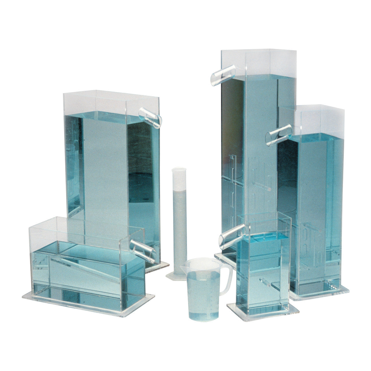 The Baseline Volumeter Set includes various transparent measuring containers, filled with blue liquid, used for volume assessment.