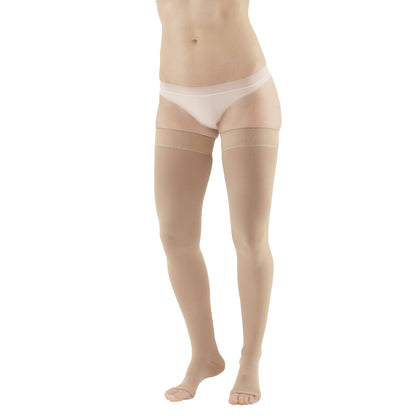 A person wears Ames Walker Open Toe Thigh-Length Medical Support Stockings, featuring a beige color and open toe design.