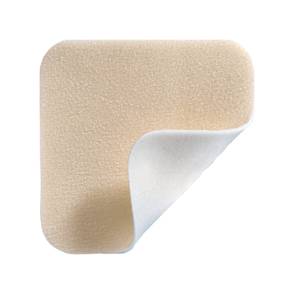 Molnlycke Mepilex Lite Dressing with a beige, textured surface and a corner lifted to show the white inner layer.