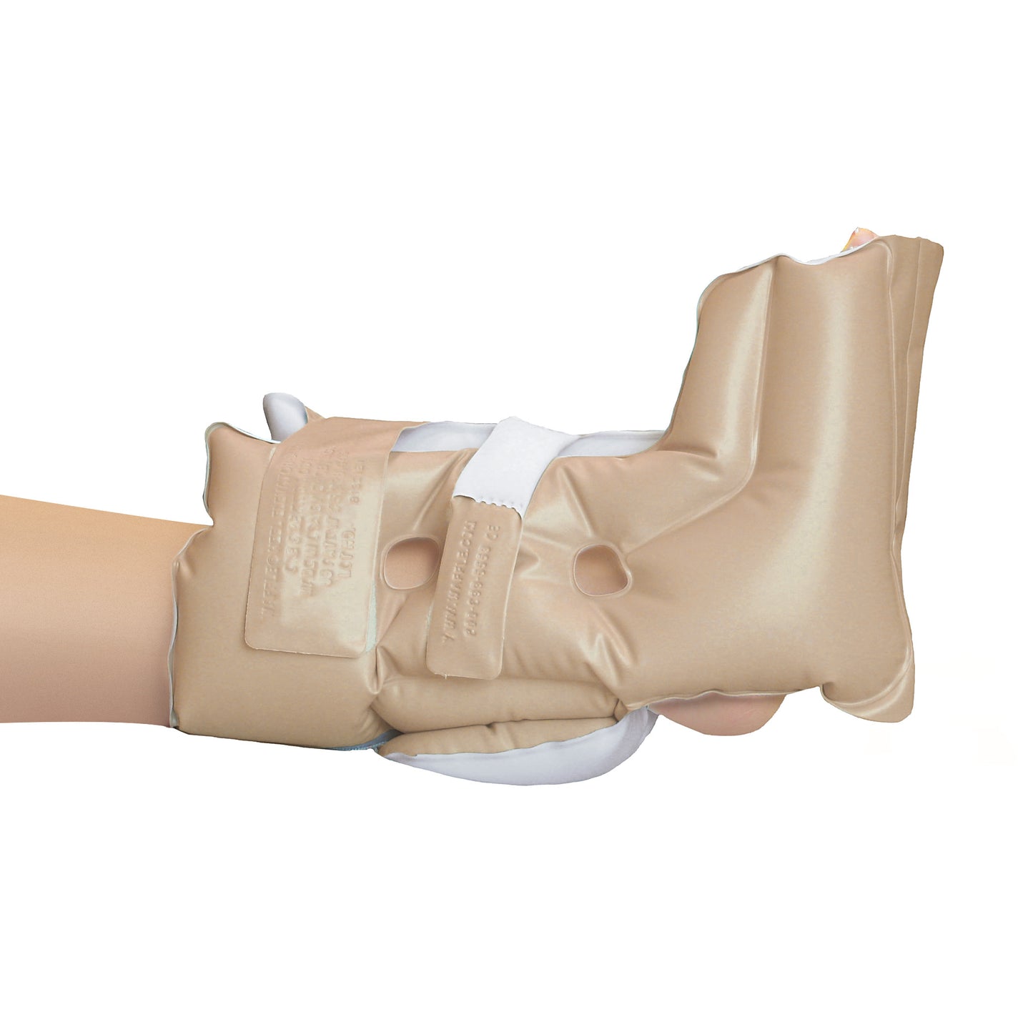 A leg wearing the EHOB Foot WAFFLE Heel Elevator, secured with white straps, to prevent pressure sores on the heel.