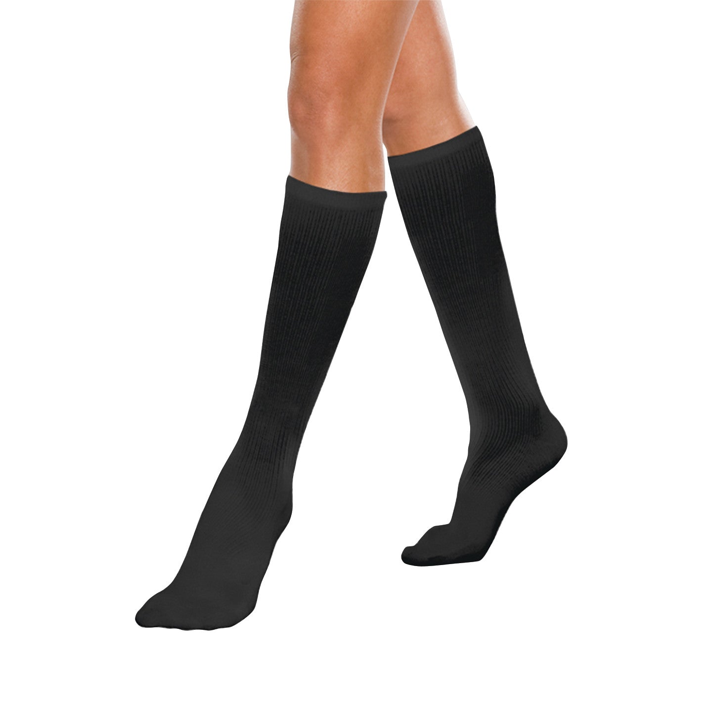 A person wearing Core-Spun by Therafirm Support Socks in black. The knee-high socks have a ribbed texture.