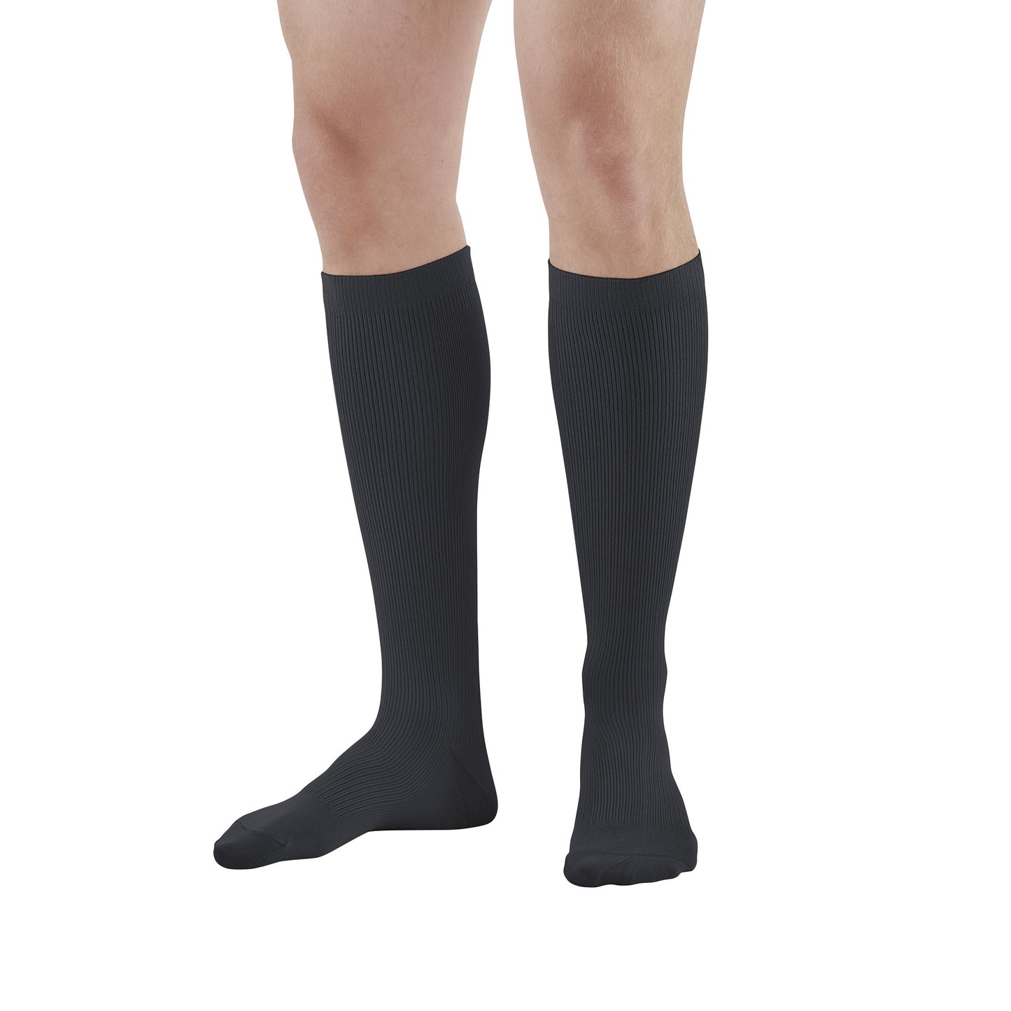 A person wearing Ames Walker Knee-Length Microfiber Support Socks in black. The socks are ribbed and reach just below the knee.