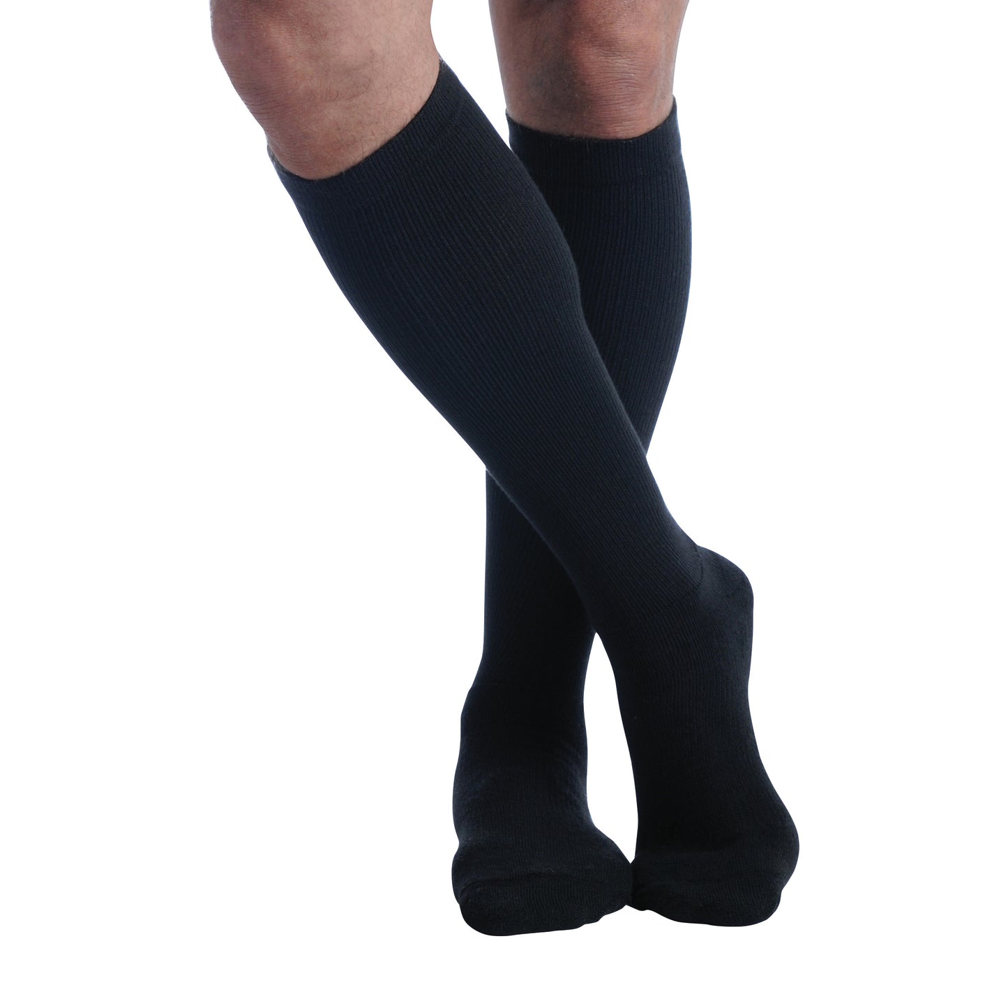 Person wearing Ames Walker Knee-Length Microfiber Support Socks in black, with legs slightly crossed.