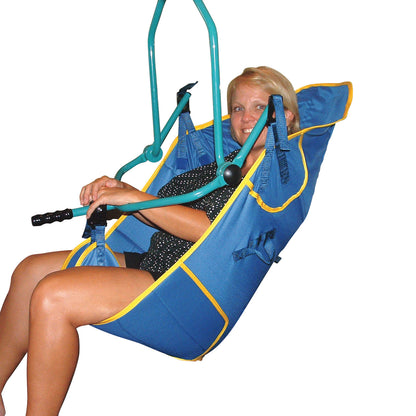 A person sits in a blue Replacement Patient Lift Sling with yellow trim and handles, supported by a green metal frame.